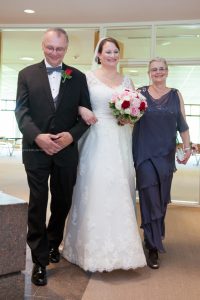 Bride family walk down aisle