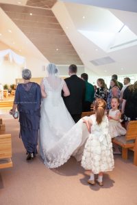 Bride walk down aisle