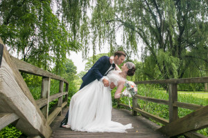 Morton Arboretum Wedding, Bride Groom portrait bend kiss